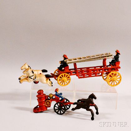 Two Painted Cast Iron Fire Wagons
