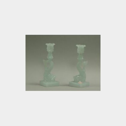 Pair of Sandwich Pressed Clambroth Glass Dolphin Candlesticks. 