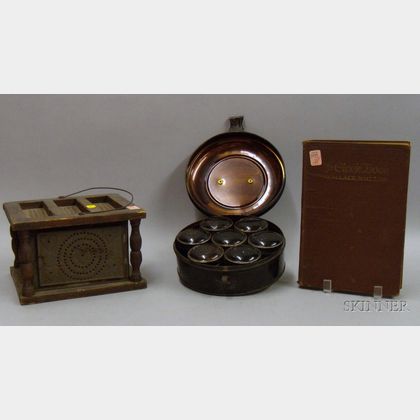 Pierced Tin and Wood Footwarmer, a Round Painted Tin Spice Box with Seven Containers, and The Clock Book