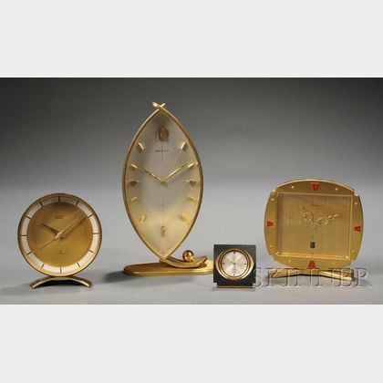 Four Brass Table Clocks