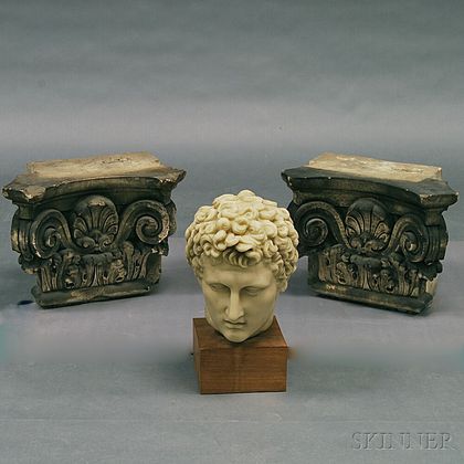 Two Concrete Corinthian Capitals and a Composite British Museum Replica Portrait Head