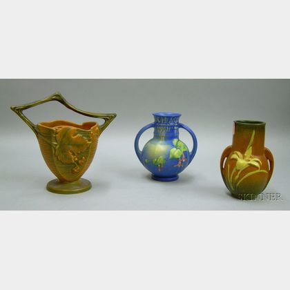 Three Roseville Pottery Fuchsia, Bushberry, and Zephyr Lily Vases. 