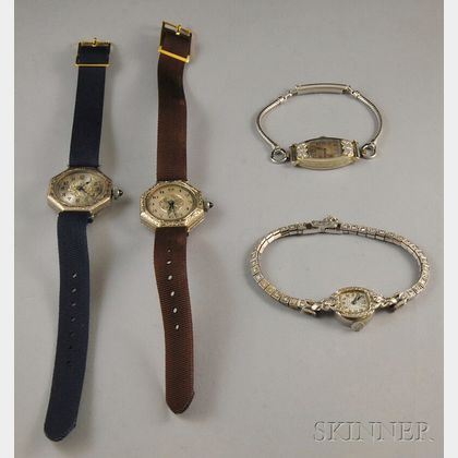 Four Mostly Gold and Platinum Wristwatches