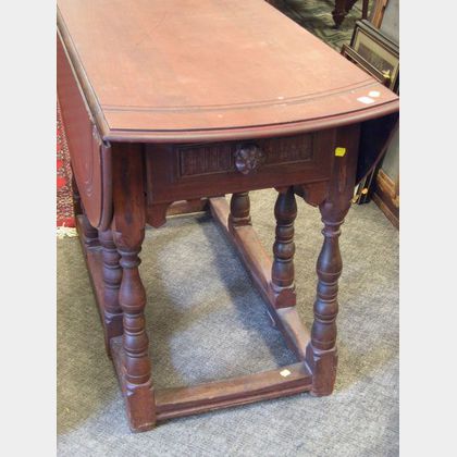 William & Mary Style Red Stained Birch, Maple, and Mahogany Drop-leaf Gate-leg Table 