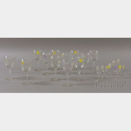 Set of Twelve Bayel Colorless Glass Wine Stems and a Set of Seven Colorless Wheel-cut Glass Cordials. 