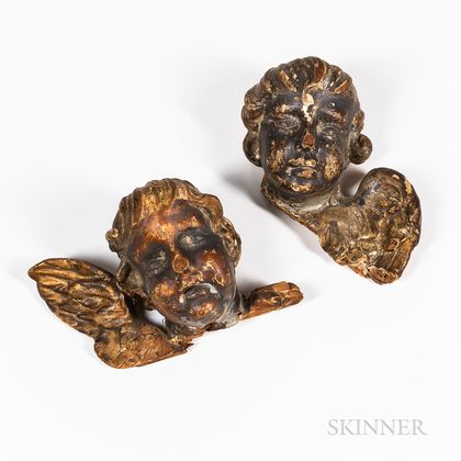 Two Carved and Gilded Cherubs