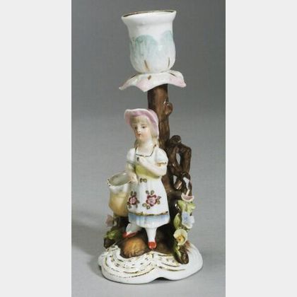 Small Glazed Porcelain Candleholder with a Child at Base