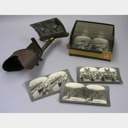 Approximately Eighty-three Keystone View Co. World View Stereo Cards and a Viewer