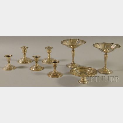 Eight Weighted Sterling Silver Candlesticks and Compotes
