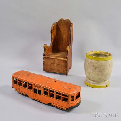 Carved Pine Doll's Chair, a Yellow-painted Mortar, and a Kingsbury Toys Train. Estimate $200-250