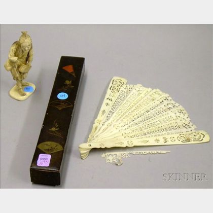 Japanese Lacquer Cased Carved Ivory Hand Fan and a Japanese Carved Ivory Figure of a Man