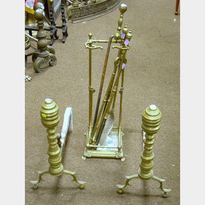 Pair of Brass Ring-turned Andirons and a Victorian Brass Stand with a Set of Three Tools, and a Pair of Brass T... 