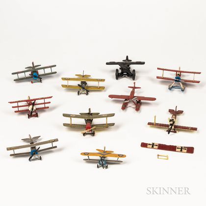 Ten Painted and Cast Metal Airplane Toys