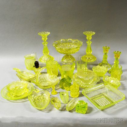 Approximately Twenty-nine Pieces of Vaseline Glass. Estimate $200-300