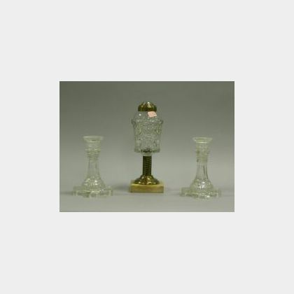 Pair of Sandwich Colorless Glass Candlesticks and a Whale Oil Lamp. 