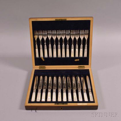 Twelve Luncheon Forks and Knives with Mother-of-pearl Handles