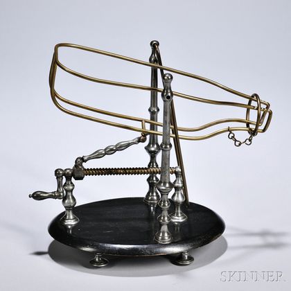 Wine Decanting Machine and Cradle, 20th century, brass wire and turned pewter, with crank-driven screw attached to a double-hinged arm 