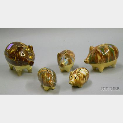 Five Pottery Pig-form Banks with Marbled Glaze