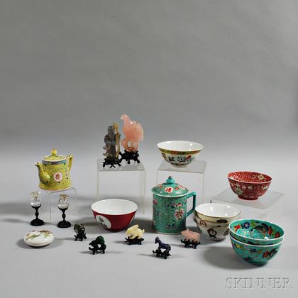 Eight Asian Bowls, a Teapot, a Tankard, and a Group of Stone Figures. Estimate $300-500