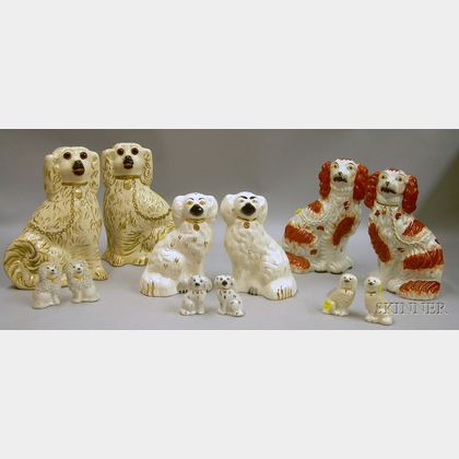 Six Pairs of Staffordshire and Staffordshire-type Seated Spaniel and Poodle Figures. 