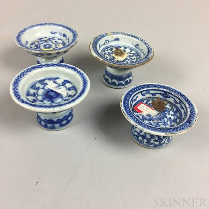 Four Small Blue and White Footed Dishes