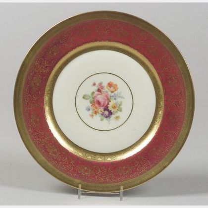 Set of Twelve Gilt and Transfer Decorated Porcelain Service Plates