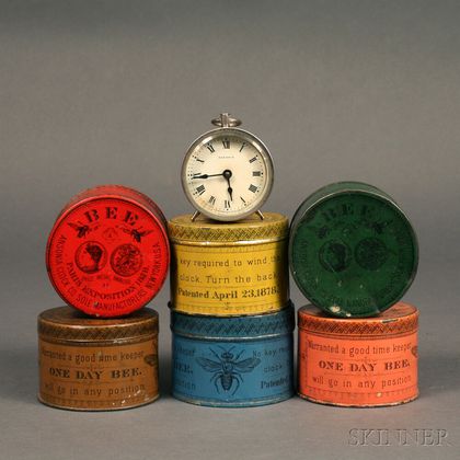 Six Ansonia "Bee" Shipping Tins and a "Bee" Clock