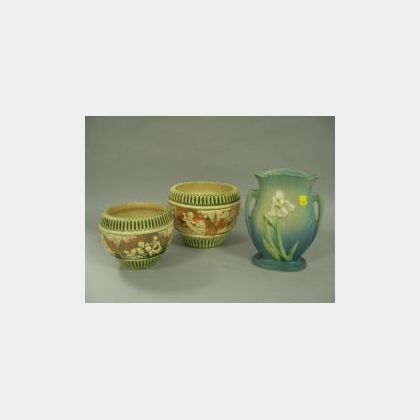 Two Roseville Pottery Donatello Jardinieres and an Iris Pattern Vase. 