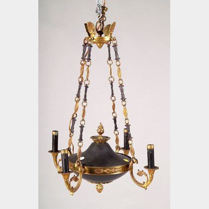 Empire-style Brass and Black Patinated Metal Four Light Chandelier