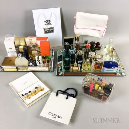 Large Group of Designer Perfume and Cologne Bottles, Bags, and Two Trays