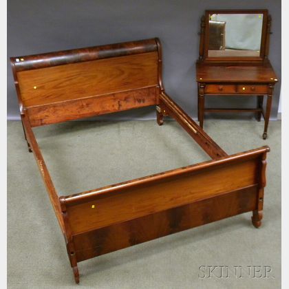 Empire Mahogany Veneer Sleigh Bed and a Classical-style Mahogany Dressing Table with Mirror