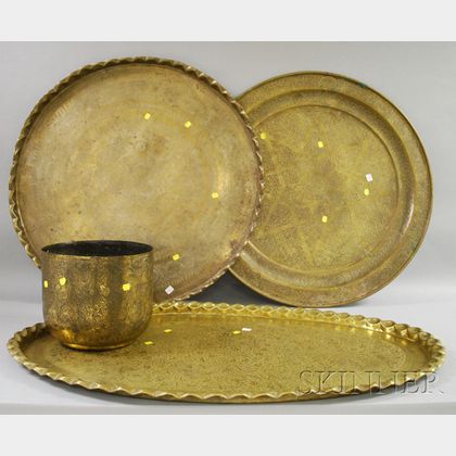 Three Large Indian Decorated Brass Trays and a Jardiniere