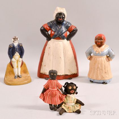 Three Cast Iron Doorstops and Two Black Dolls. Estimate $20-200