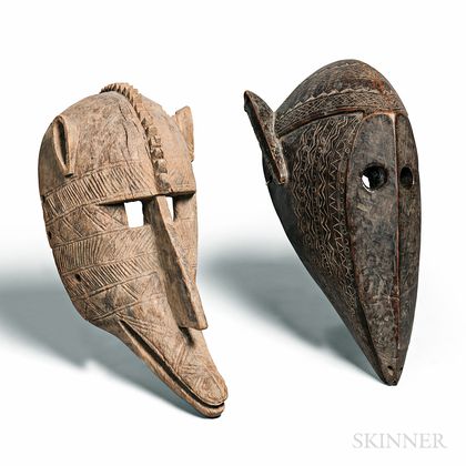 Two Surukuw Carved Hyena Masks
