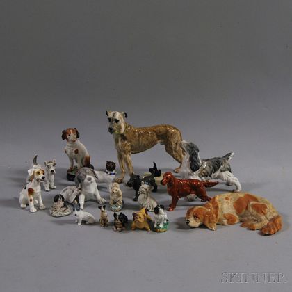 Nineteen Ceramic and Metal Dog Figurines