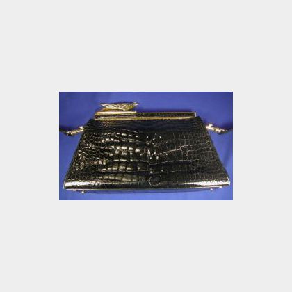 Vintage Alligator Handbag, Judith Leiber, the tapered rectangular bag with gold tone frame, closure as stylized falcon, removeable leat