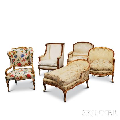 Five French-style Carved and Gilt Armchairs