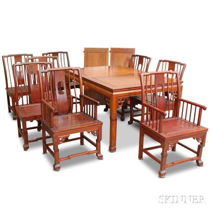 Chinese-style Carved Hardwood Dining Table and Eight Chairs. Estimate $20-200