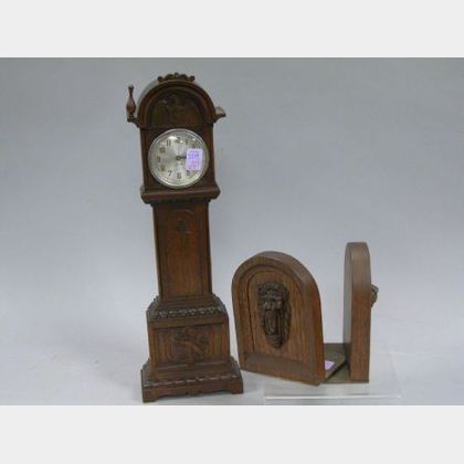 Sessions Miniature Carved Mahogany Tall Clock and a Pair of Carved Mahogany Lion Mask Bookends. 