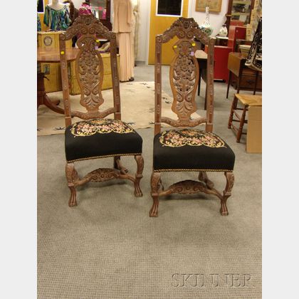Pair of Continental Baroque-style Needlepoint Upholstered Carved Walnut Hall Chairs. 
