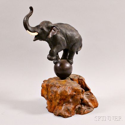 Bronze Elephant and a Carved Wood Buddha on Stand