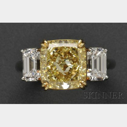 Platinum and Fancy Yellow Diamond Solitaire