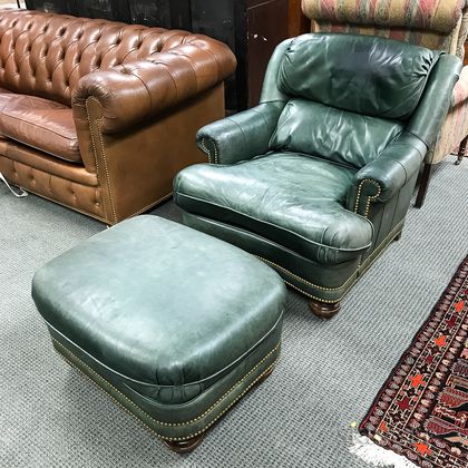 Modern Green Leather-upholstered Easy Chair and Ottoman. Estimate $150-250