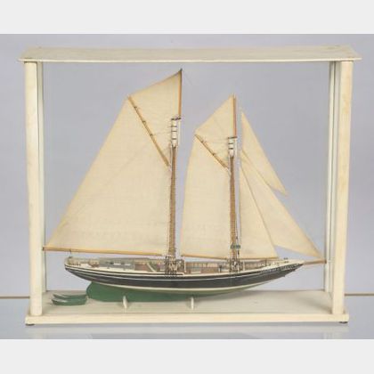 Cased Carved and Painted Wooden Two-Masted Sailing Ship Model Gertrude L. Thebaud