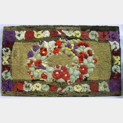 Mounted Wool and Cotton Hooked Rug with Raised Floral Wreath Design. 