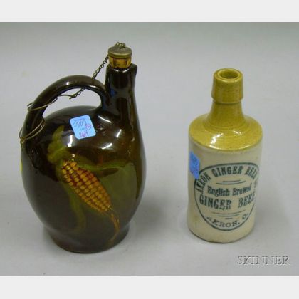 Owens Pottery Standard Glazed Corn Decorated Whiskey Jug and an Akron Ginger Beer Stoneware Bottle. 