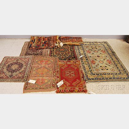 Six Rugs and a Pair of Printed Liberty of London Cloth Bolts