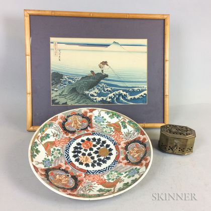 Satsuma Porcelain Charger, a Brass Cricket Box, and a Framed Japanese Woodblock Print. Estimate $200-250