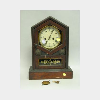 Jerome & Co. Walnut and Eglomise Shelf Clock. 