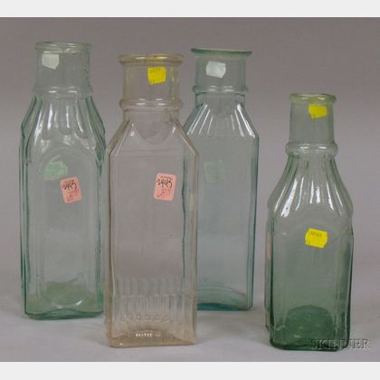 Four Aqua and Colorless Blown and Molded Glass Pickle Bottles